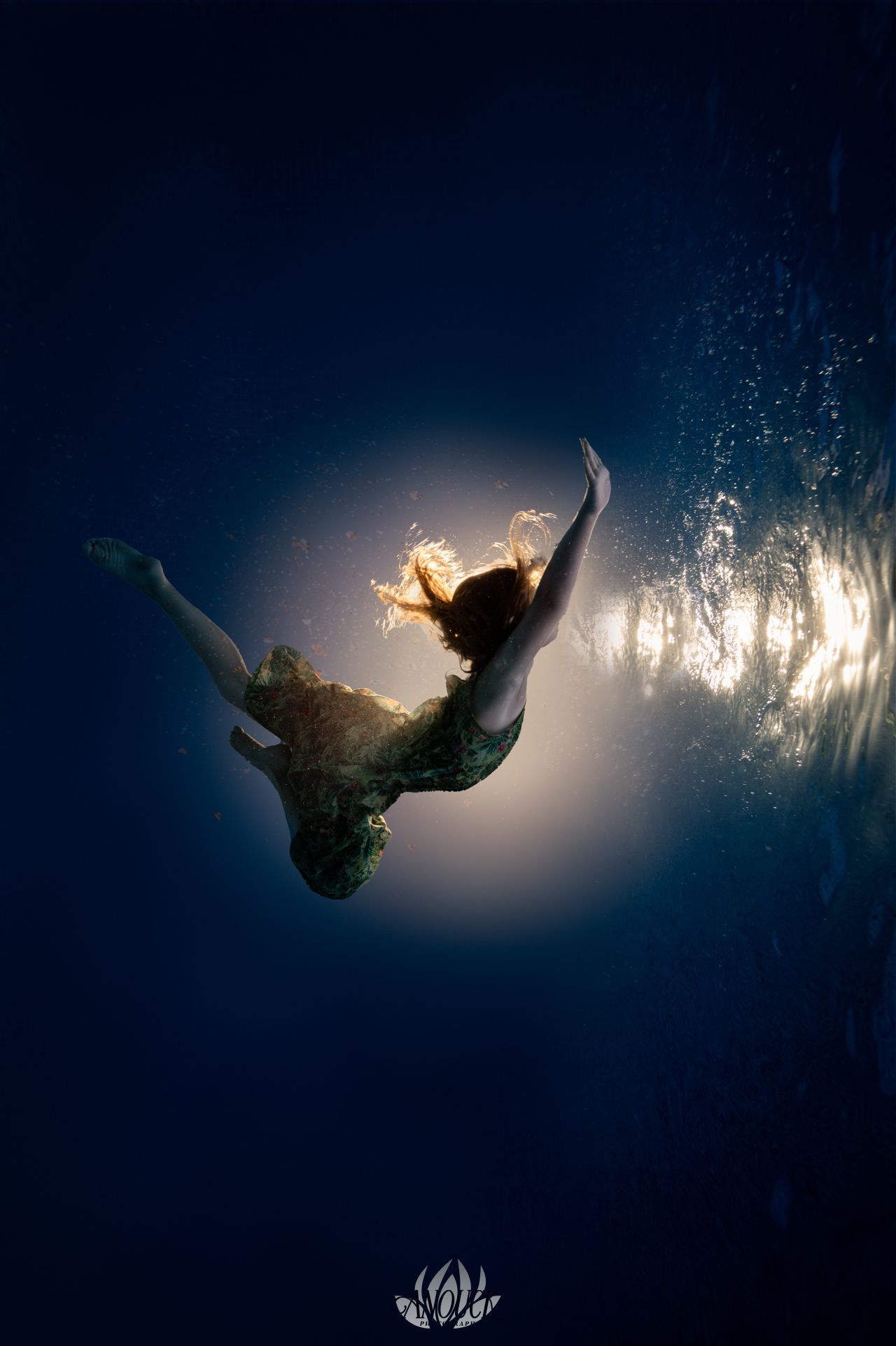 Portrait artistique sous l’eau lors d’une séance aquatique guidée